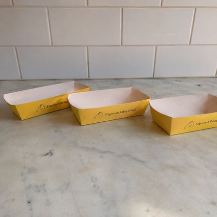 Personalized hot dog trays with a logo